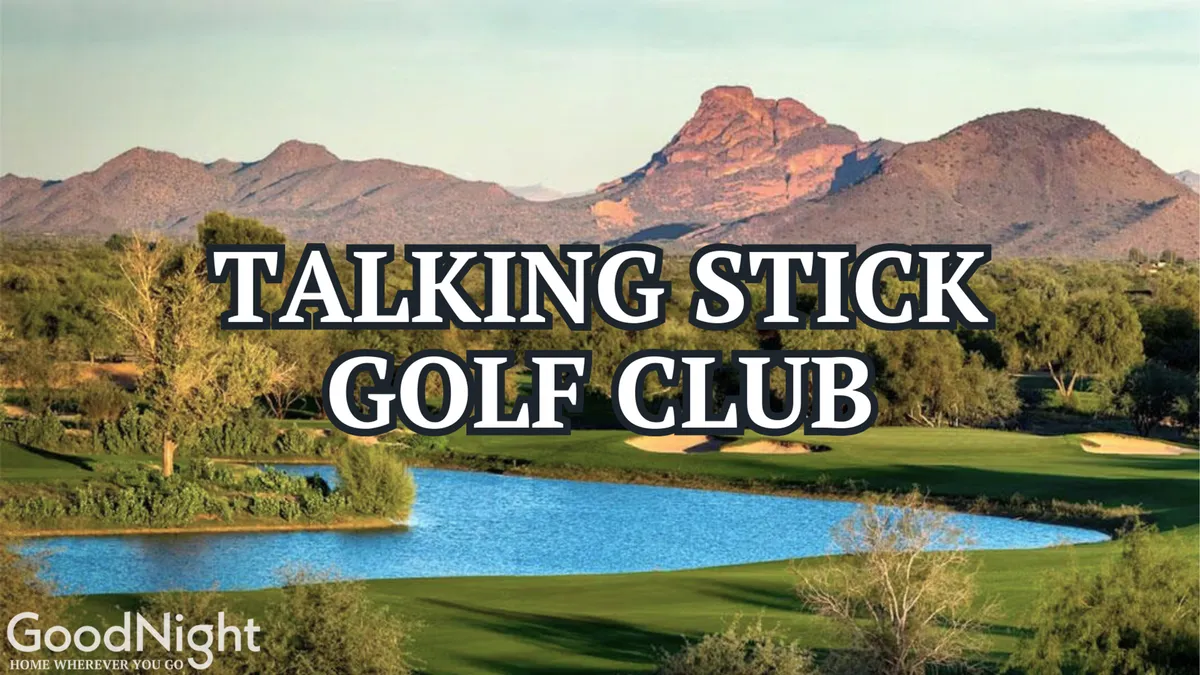 A sweeping view of a lush green golf course bordered by a tranquil lake, mature trees, and mountains in the distance. The peaceful scene highlights the outdoor recreational opportunities and scenic beauty found just beyond the property.